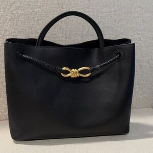 Elegant Black Tote Bag with Gold Accent
